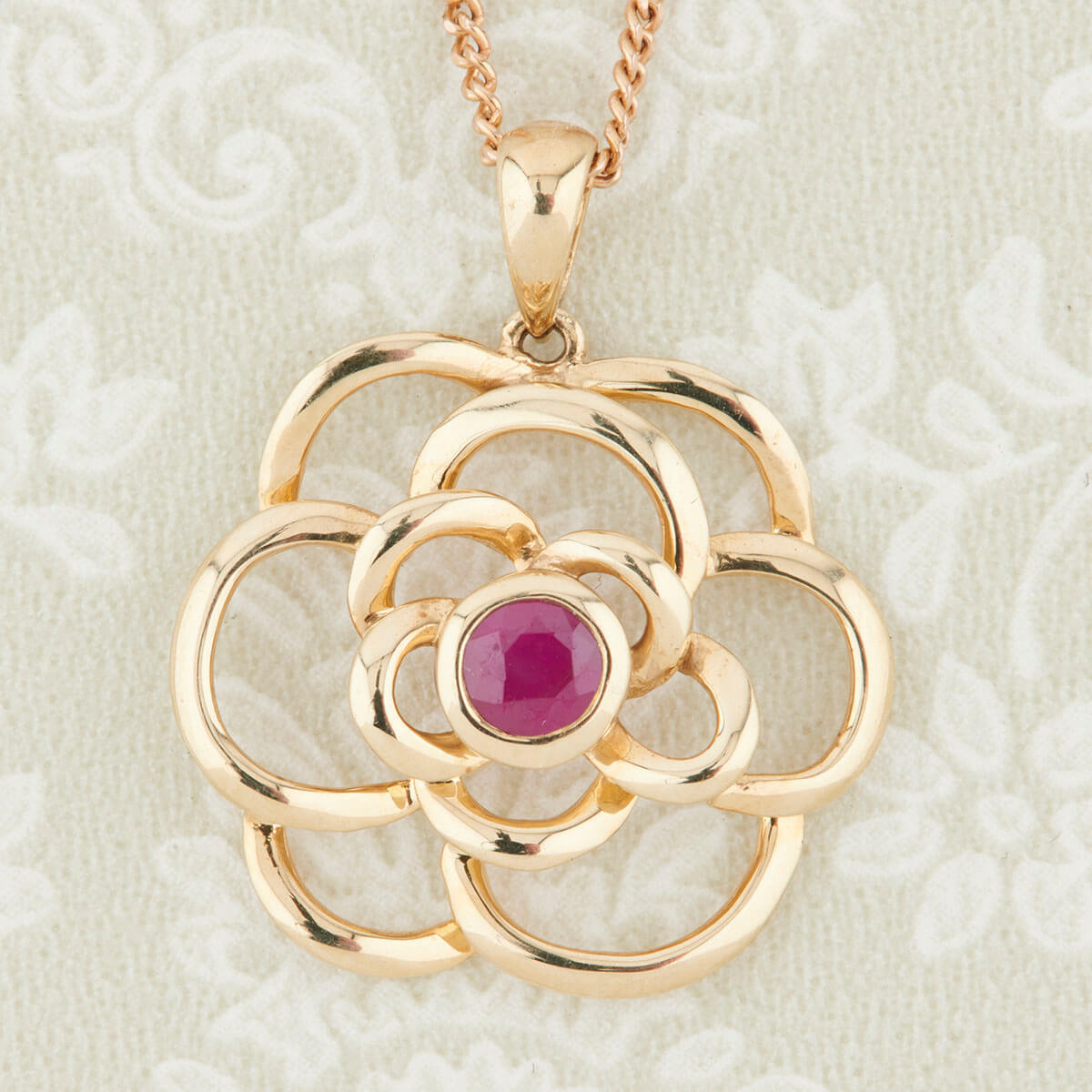9ct Gold Ruby Flower Pendant and Chain | RH Jewellers