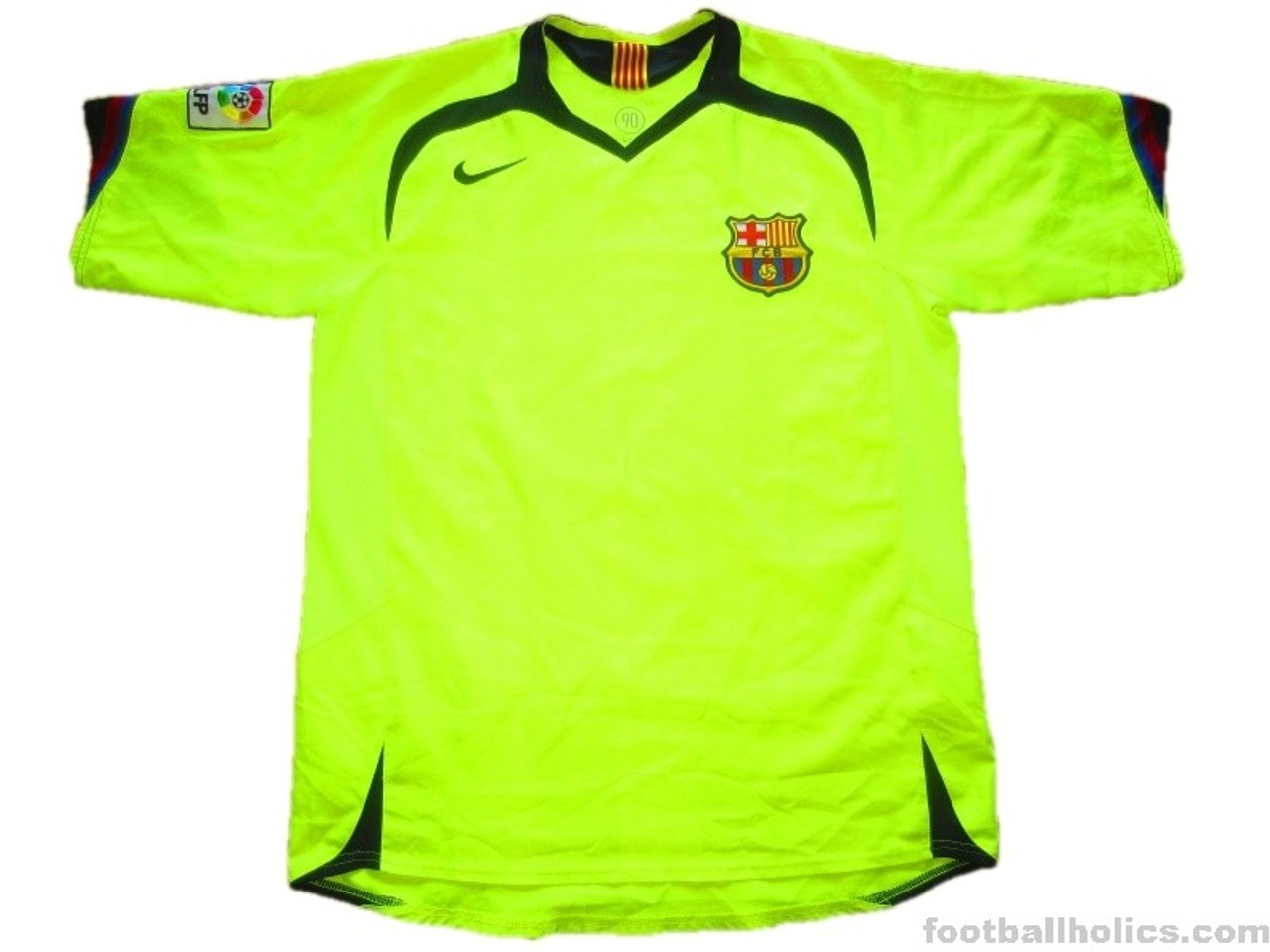 navy blue and neon green nike shirt