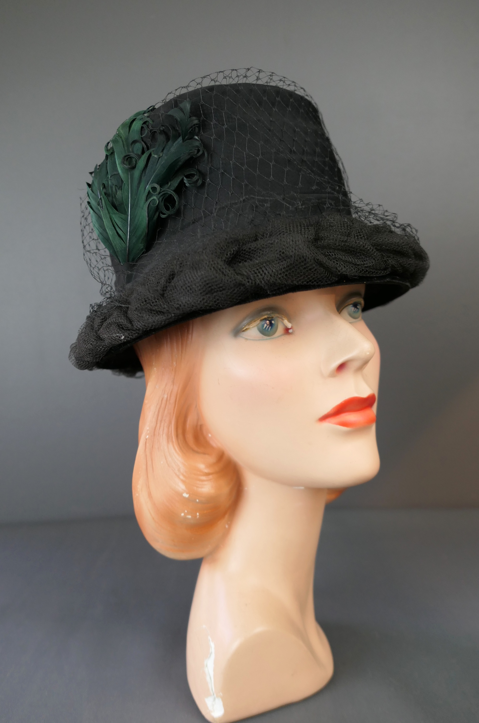 Vintage Black Hat with Green Feather, Chiffon and Braided Tulle, 1960s, 21 inch head