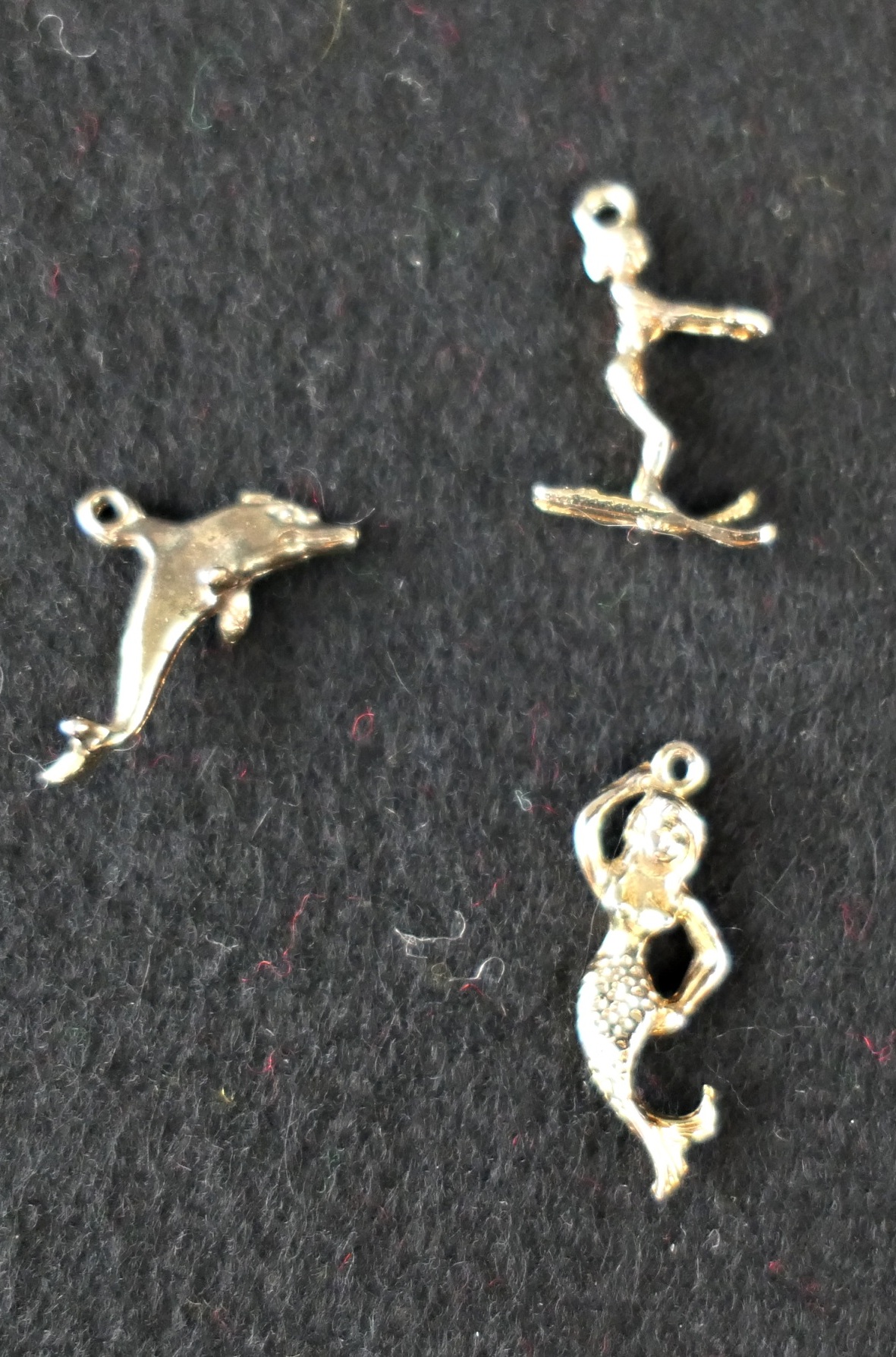 3 Vintage Charms Water Skier, Mermaid and Dolphin, Novelty for Bracelet, gold tone metal, unmarked