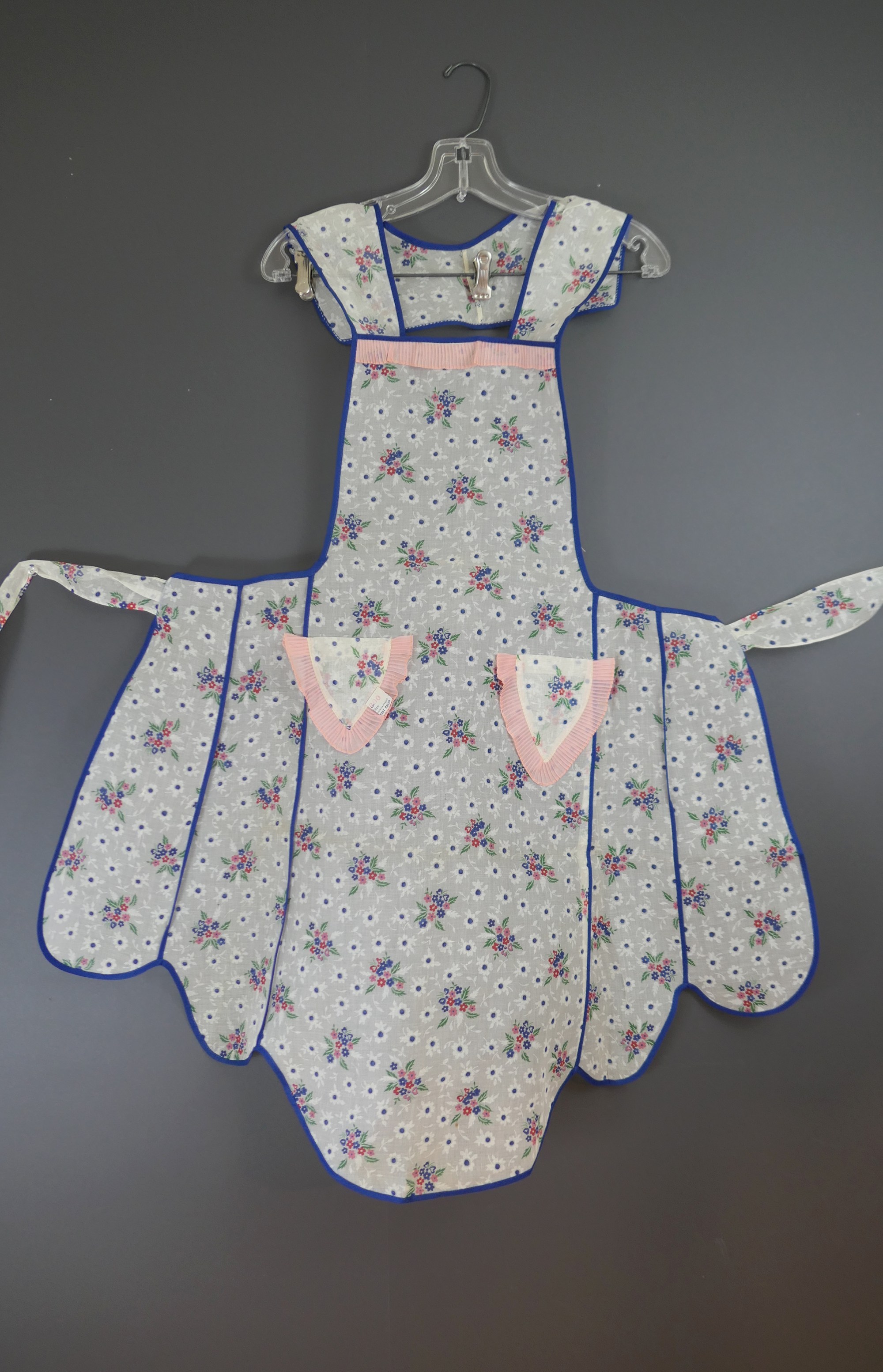 Vintage 1940s Full Apron Floral, Organdy with Pink Pleats and Blue Flowers, unused with label