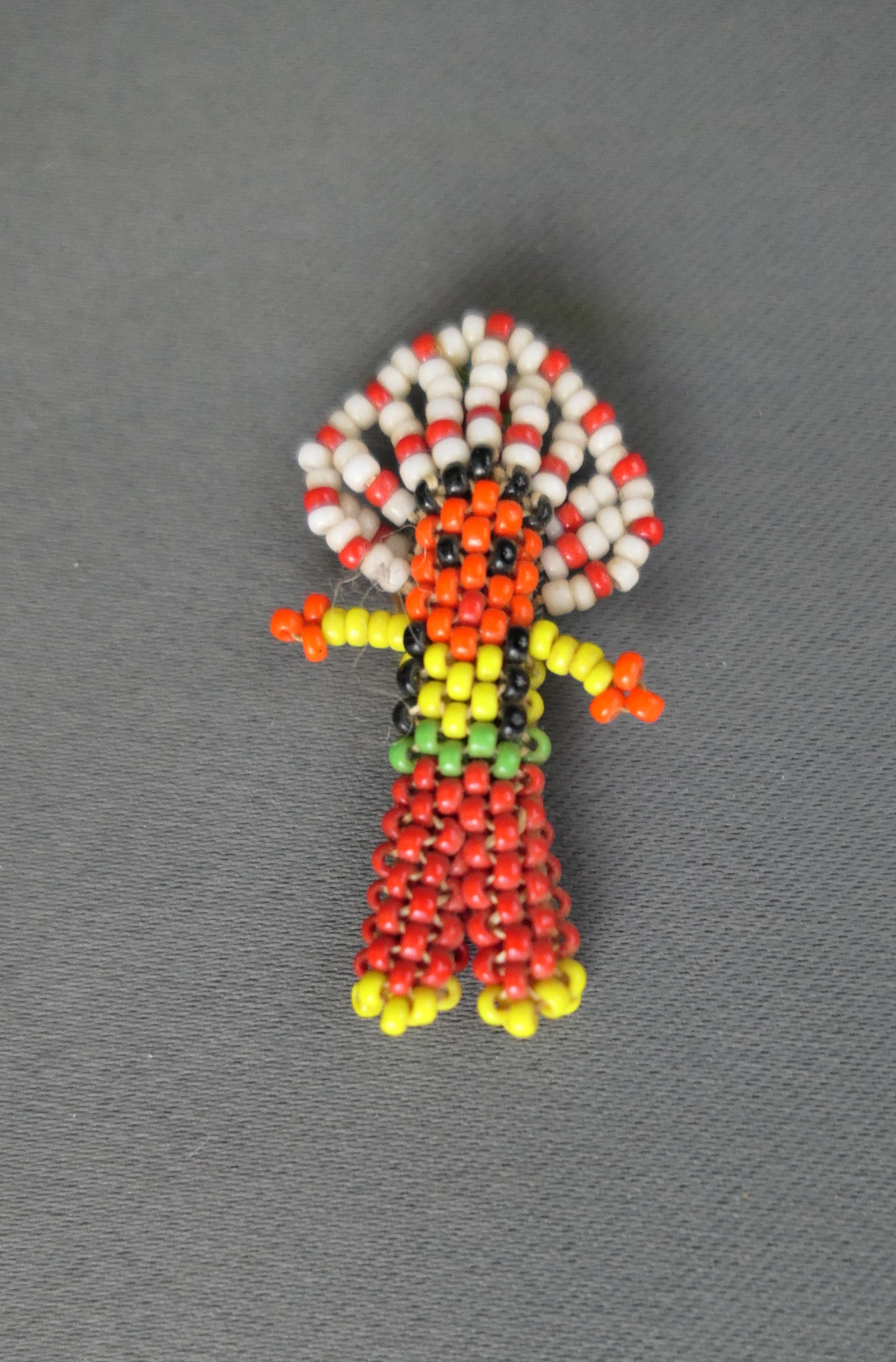 Vintage Native American Beaded Indian Chief, small handmade souvenir, pendant figure