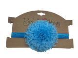 Our soft and puffy Giant Shabby Flower is attached to a 5/8" width Satin Stretch Headband.  Overall width is approximately 6", comfortably stretches to approximately 9".  Flower and headband match, unless otherwise requested.  Perfect for newborn through toddler.