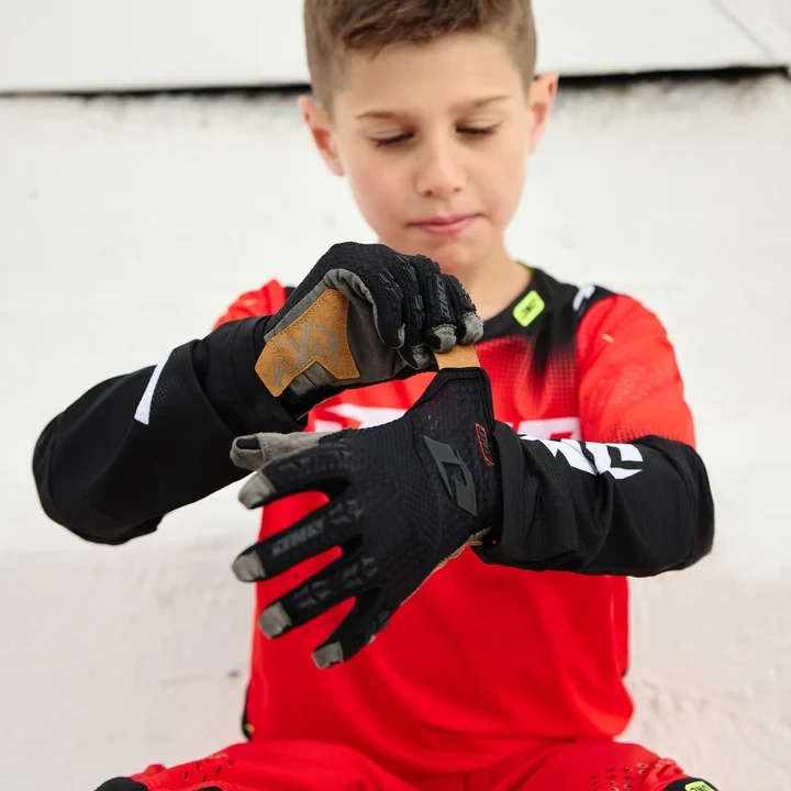 The top closure glove is not for everyone and for those riders who prefer a more traditional glove the One Industries X-197 offers rubber protection on the knuckles and a secure wrist closure.
