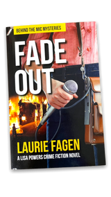 book cover with hand holding microphone and title "Fade Out" in white across the top