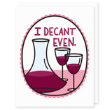 White card with image of wine decanter and two wine glasses and lettering in red wine colors.