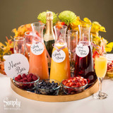 Various juices on a tray as a Mimosa Bar