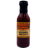 Glass bottle containing brown BBQ sauce. 