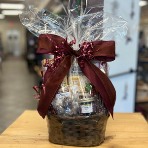 Cello wrapped gift basket with burgundy bow