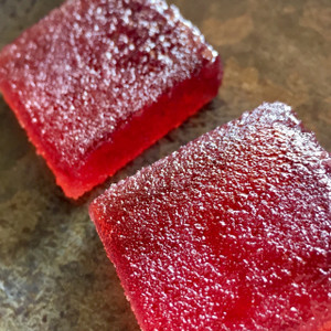 Two unwrapped candy pieces.