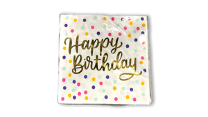 square paper napkins wrapped in clear plastic with polka dots and "Happy Birthday" written in gold.