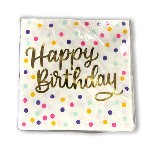 square paper napkins wrapped in clear plastic with polka dots and "Happy Birthday" written in gold.