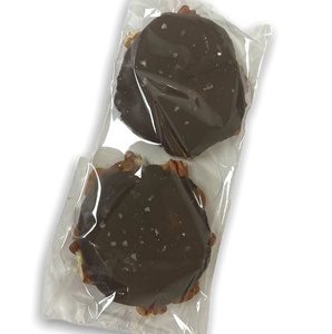 clear, flat food bag containing two pieces of candy