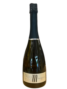 Dark glass champagne shaped bottle with tan front label with black lettering