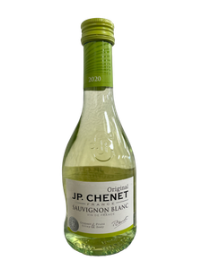 small clear glass wine bottle with white and green label