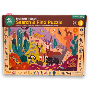 Large rectangular box in dark yellow and brown with image of completed puzzle of with animals and cactus of the southwest.