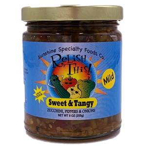 Round glass jar with gold lid containing relish.