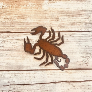rustic steel magnet in the shape of a scorpion