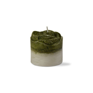 Round wax candle with ivory color base and green top in the design of a succulent.