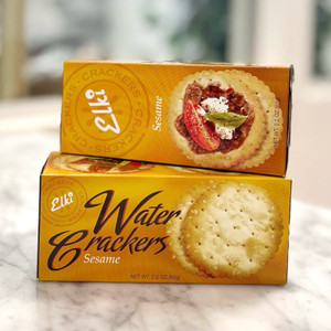 Two stacked yellow long, rectangular box with image of crackers and lettering in black
