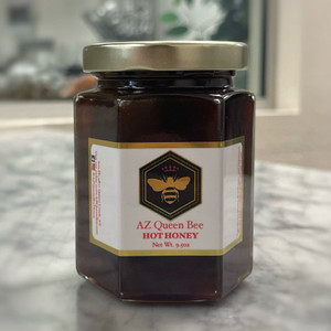 photo showing jar full of dark honey, label with AZ Queen Bee logo and product name "hot honey" on the front. for a full description please see the description box