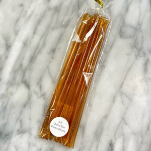 Desert bloom honey straws on a marble counter