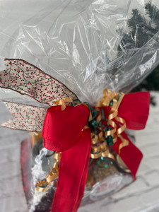 Close up of bows on wrapped gift basket. Close up of bows on wrapped gift basket.