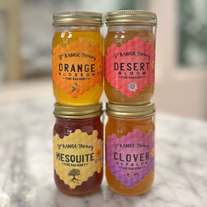group of all four Rango Honey six ounce jars; desert bloom, orange blossom, mesquite, and clover alfalfa