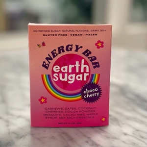 a pink box with the Earth Sugar logo in the middle and a description of the Choco Cherry bar. See product description for product info
