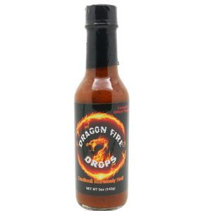 Thin glass bottle with black top and black front label with yellow flames and a dragon