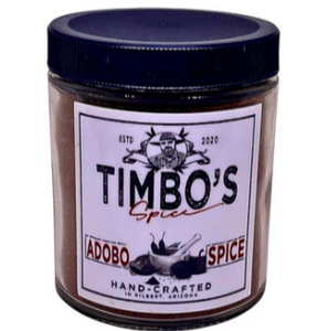 Clear jar with black cap, white label with black and red lettering 