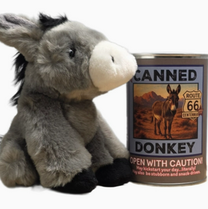 Gray plush donkey next to gray can and front label with black lettering and picture of a donkey