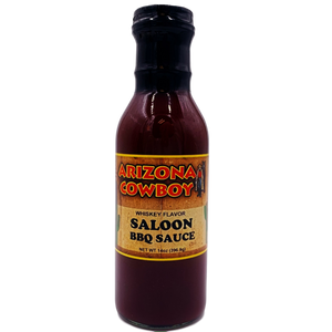Glass bottle containing brown BBQ sauce. 