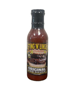 Tall clear glass bottle with black cap containing red brown sauce with black label with picture of a thick bbq sauced meat patty between a sesame seed bun; "Sting N Linger" written across in yellow font