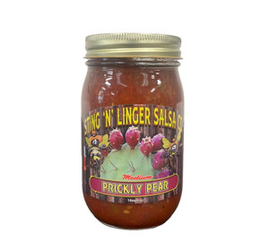 A tall cylindrical glass jar with gold lid containing red salsa; the label says “Sting N Linger Salsa” across the top in yellow font, the companies logo of two cowboy-like bee’s in the middle around a photo of a prickly pear cactus
