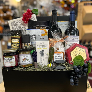 Black gift box displaying all contents of gift.