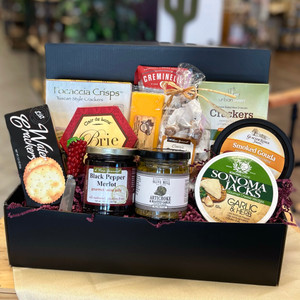 black gift box displaying all contents of gift
