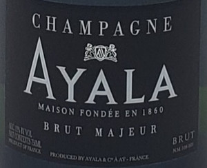 Close up of black front label with white lettering