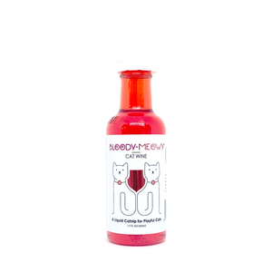clear plastic bottle with white cap containing red liquid with white front label