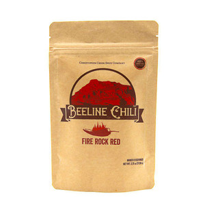 brown paper bag with image of Red Mountain
