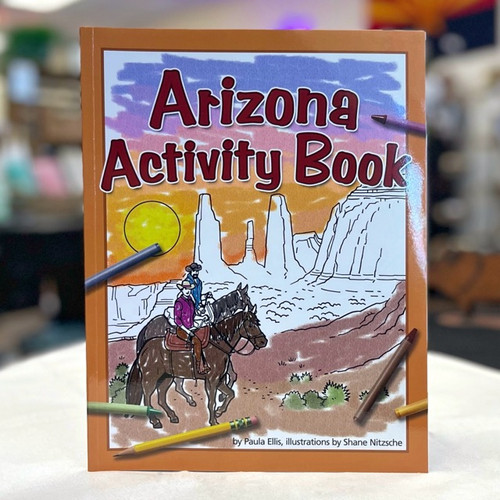 Book cover with a partially colored Arizona scene with horses and crayons. Book cover with a partially colored Arizona scene with horses and crayons.