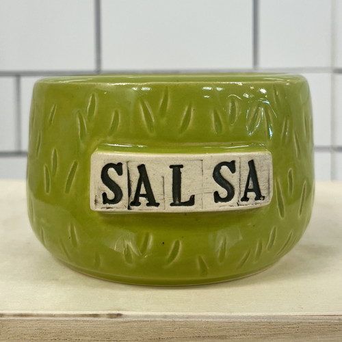 green ceramic bowl with the pattern of a prickly pear cactus and the word 'Salsa' on a white back ground with black lettering green ceramic bowl with the pattern of a prickly pear cactus and the word 'Salsa' on a white back ground with black lettering