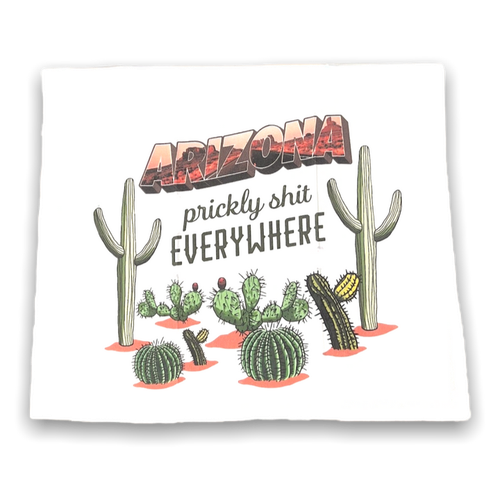 White dish towel with Arizona along the top, many cacti, and the phrase Prickly Shit Everywhere