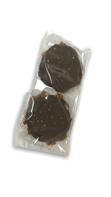 clear, flat food bag containing two pieces of candy