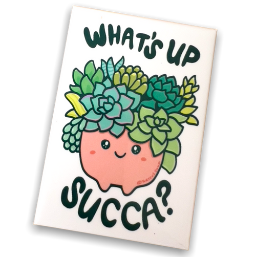 White rectangular magnet with drawing of succulents in a bowl with a smiley face and letting in black.