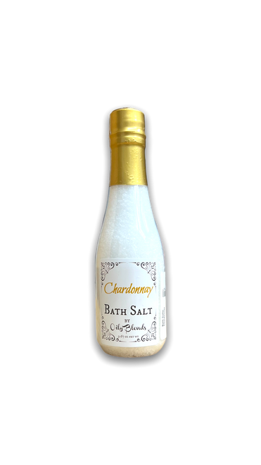 wine bottle shaped plastic bottle containing white bath salts with a white front label