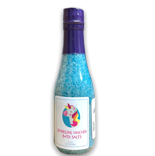 wine bottle shaped clear plastic bottle containing blue and purple bath salts with a white label