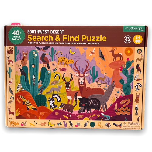 Large rectangular box in dark yellow and brown with image of completed puzzle of with animals and cactus of the southwest.