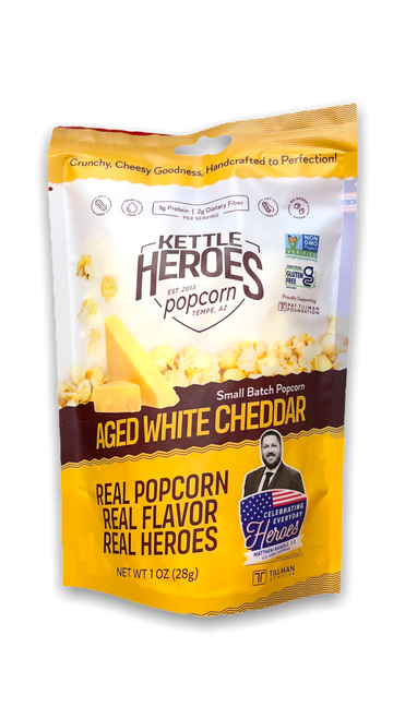 Tall bag in white and yellow with image of popcorn and cheddar cheese