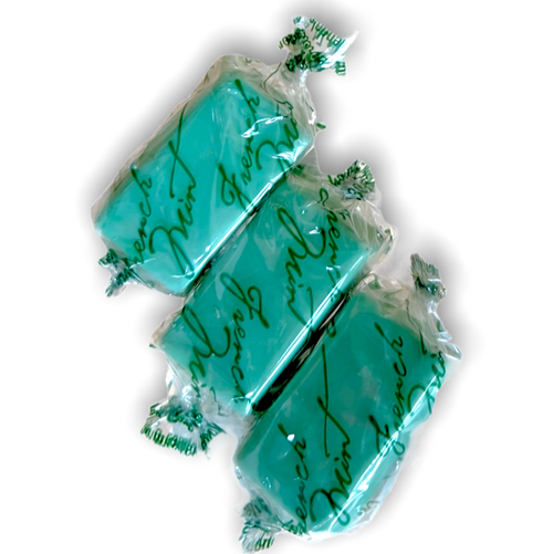 Three wrapped truffles side by side. Each truffle is rectangular and mint green in color